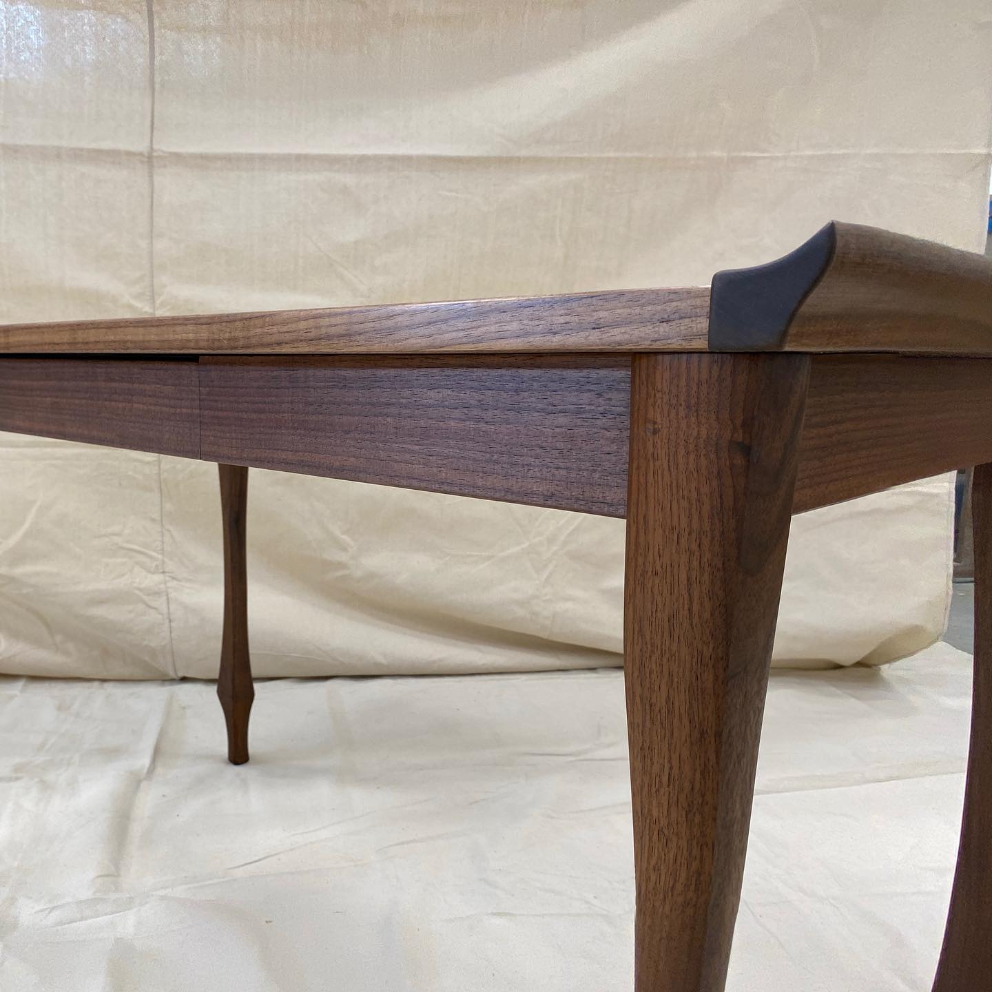 Leather top writing desk, brass inlay, hand rubbed oil walnut. Kid checking out the bird feeder. @spinneybeck