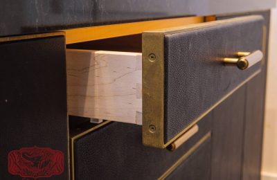 Leather and brass cabinets