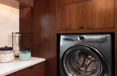 custom walnut laundry built-in cabinets